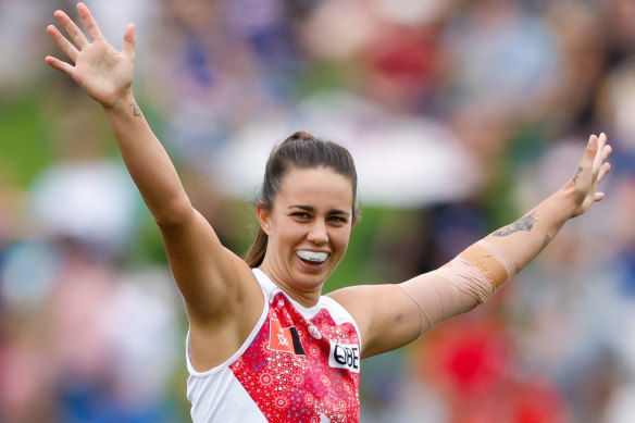 Chloe Molloy of the Swans celebrates a goal in a match against the Western Bulldogs.