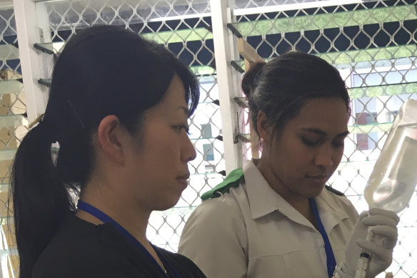 Japanese medical support in Samoa during a measles outbreak.