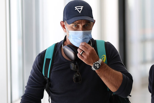 Justin Langer arrives at Perth Airport on Saturday after resigning as head coach of the Australian men’s team.