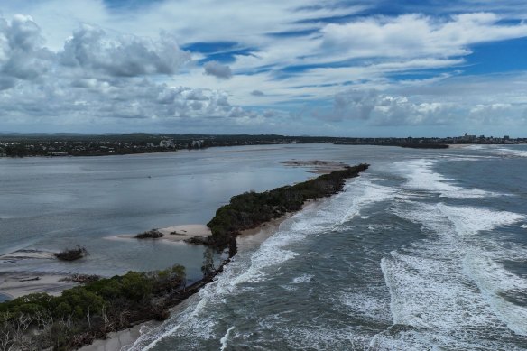 The first breakthrough on Bribie Island (top) was caused by Seth in 2022, with Alfred causing a second, smaller breakthrough (bottom) in March.