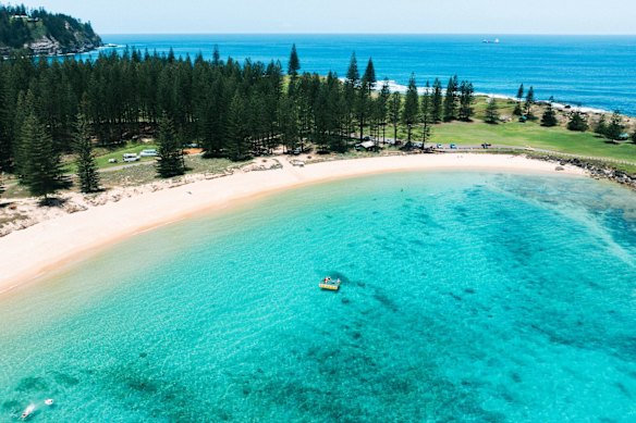 Stunning Emily Bay with the island’s namesake pines.
