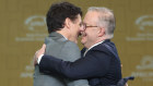 Prime Minister of Canada Justin Trudeau and Prime Minister Anthony Albanese greet each other at the APEC Leaders’ Informal Dialogue in Lima, Peru last year.