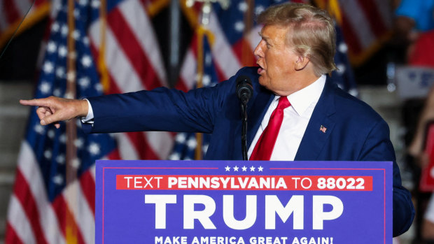 Facing legal peril, Trump calls on GOP to rally around him and focus on investigating Biden
