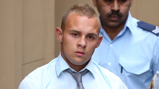 SMH NEWS. October 25, 2013. Sentencing hearing of Keiran Loveridge on trial for the Murder/Manslaughter of 19-year-old Thomas Kelly in Kings Cross. Keiran Loveridge is escorted back to the prison van after the end of the day’s hearing. Photo by Brianne Makin BRI_3820.jpg