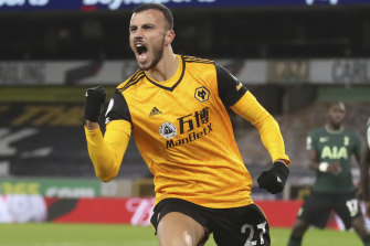 Romain Saiss of Wolves celebrates after snatching a point against Tottenham.