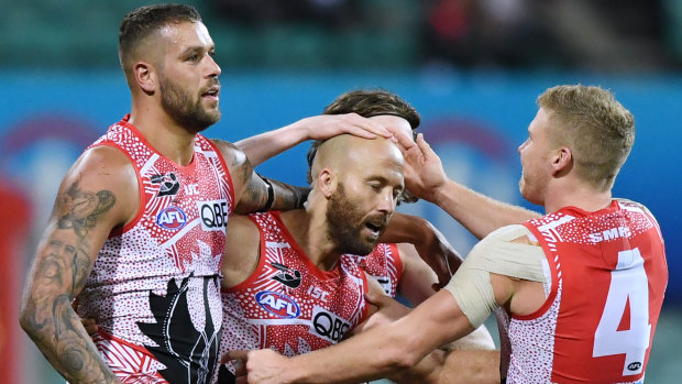 Fine form: Jarrad McVeigh with teammates.