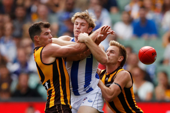 Top pick Jason Horne-Francis battles Jaeger O’Meara  for the ball in his first match.