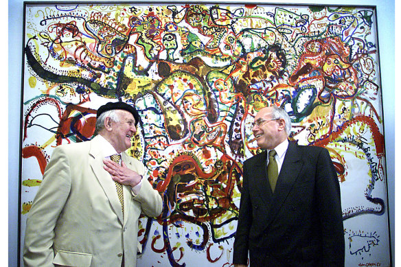 Then prime minister John Howard (right) with artist John Olsen at the opening of the Tarrawarra Museum of Art – founded by Marc and Eva Besen.