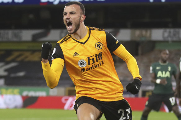 Romain Saiss of Wolves celebrates after snatching a point against Tottenham.