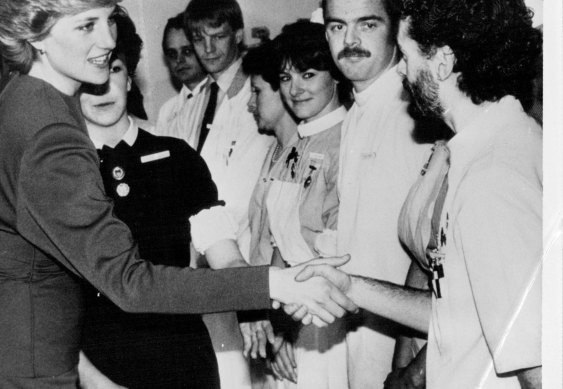 Princess Diana shakes hands with Shane Snape, who had the AIDS virus.