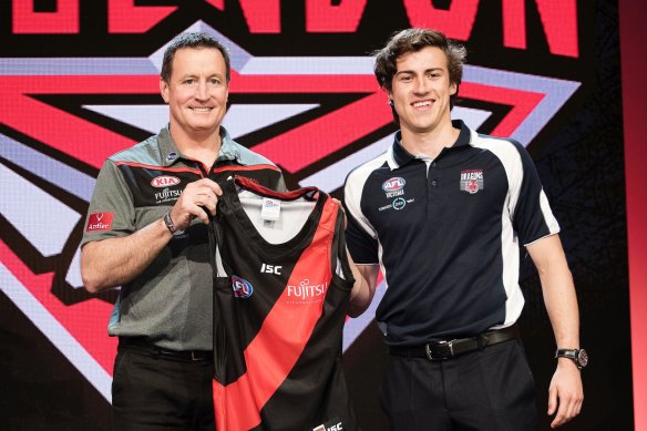 McGrath (pictured with former coach John Worsfold) was taken with the No.1 pick by the Bombers in 2016.