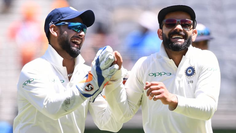 Chatterbox: Rishabh Pant, left, is becoming renowned for his running commentary in Hindi and English.