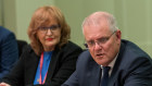 “Reform without proper investment is not worth the paper it’s written on,” says Dr Price, pictured with Scott Morrison at a roundtable in 2021.