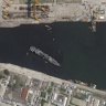 North Korea raises capsized warship damaged in botched launch