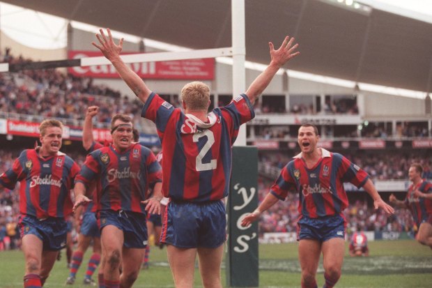 Iconic: Darren Albert scores for the Knights to win the 1997 grand final at the SFS.