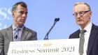 Economics Editor John Kehoe and Reserve Bank of Australia Governor  Philip Lowe at the Australian Financial Review Business Summit 2021.