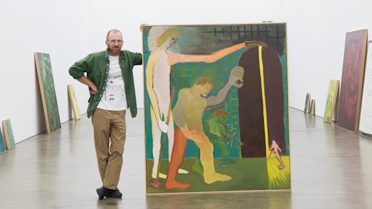 Artist Kieren Seymour at Neon Parc gallery in Brunswick, where he is selling artworks along with their unique NFT.