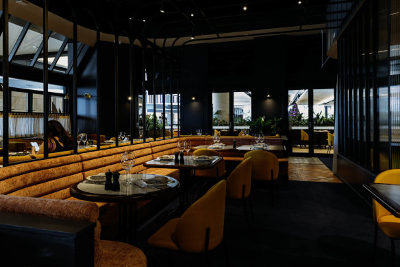 Pompette’s design features flashes of French inspiration with fluted glass and timber-edged tables and mosaic-tile flooring.