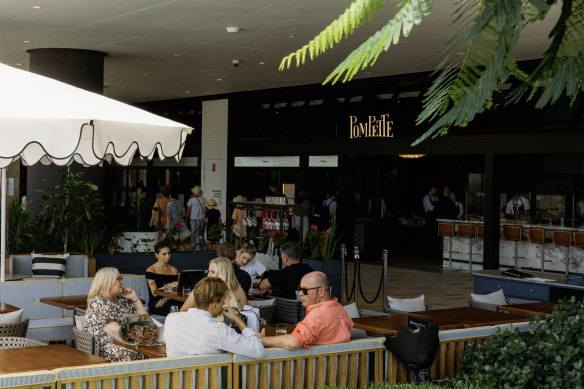 Pompette features an al fresco dining area with views north up the river.