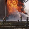 Firefighters battle the petrol tanker crash at Medlow Bath in 1992. Test results suggest the fire may be a cause of the PFAS contamination.