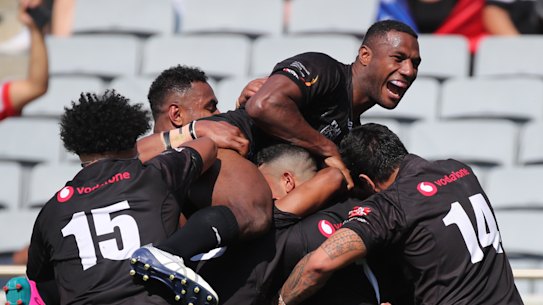 Fiji celebrate during their dominant performance against Samoa at Eden Park.