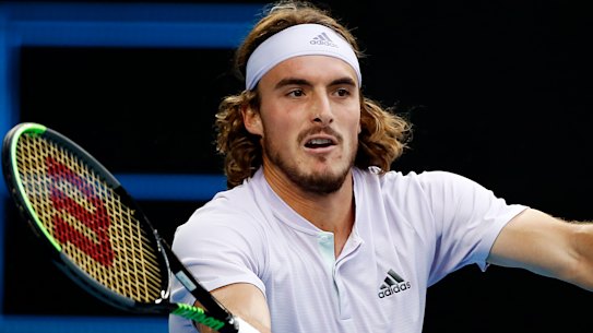 Greek star Stefanos Tsitsipas goes down to Canada's Milos Raonic on Friday night.