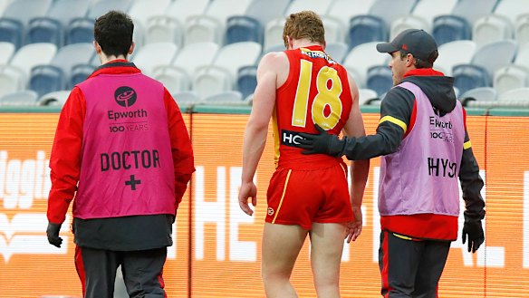Matthew Rowell leaves the field.