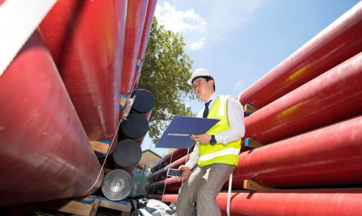 Envac Korea senior manager Daniel Parks inspects pipes from South Korea.