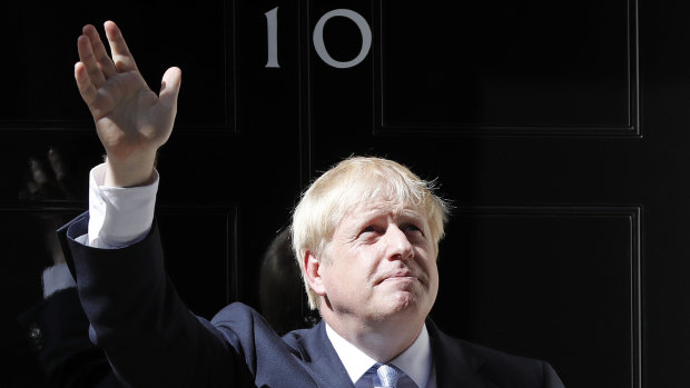 New British Prime Minister Boris Johnson enters 10 Downing Street.