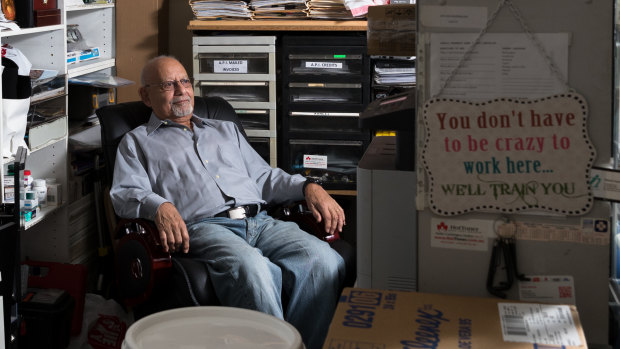 Morris Morcos in his pharmacy in Granville, where he has worked for 45 years.