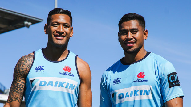 Big brothers: Israel and John Folau pose for a photo before the Waratahs' match against the Sunwolves in round seven. 