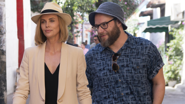 Charlize Theron, left, and Seth Rogen play the odd couple in Long Shot. 