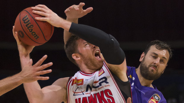 Gimme: Andrew Bogut fouls Brian Conklin to give him a pair of shots from the free-throw line at Qudos Bank Arena.