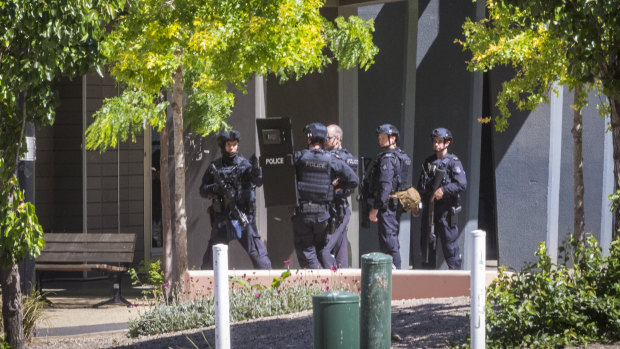 Special operations police surrounded the apartment block on Tuesday. 
