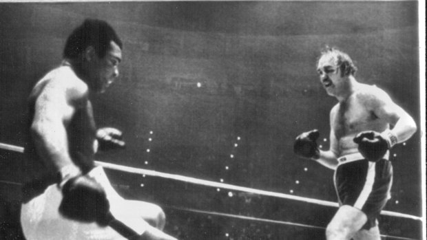 The champ goes down: Chuck Wepner sends Muhammad Ali  to the canvas in 1975.