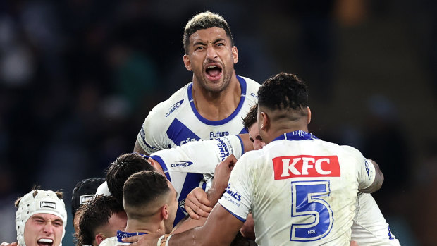 Viliame Kikau of the Bulldogs celebrates with team mates during their win over Cronulla in round 17.