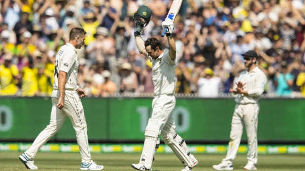 Hats off: Travis Head celebrates his century on day two of the Boxing Day Test.