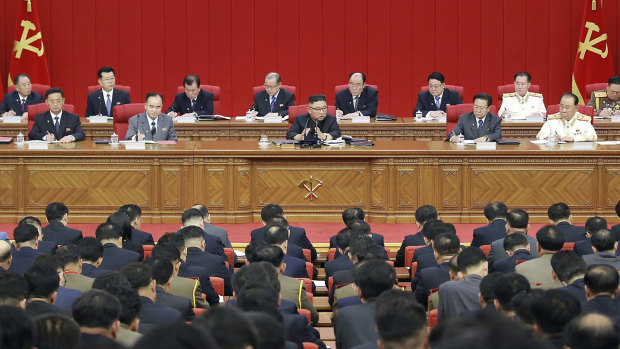 Kim, centre, recently warned about possible food shortages and called for his people to brace for extended COVID-19 restrictions.