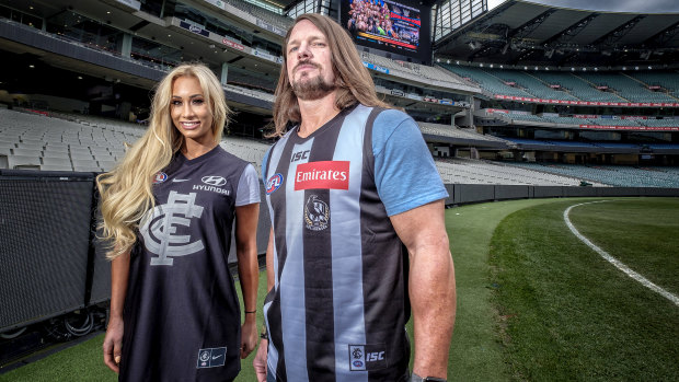 Champion wrestlers Carmella and AJ Styles show off their new colours.