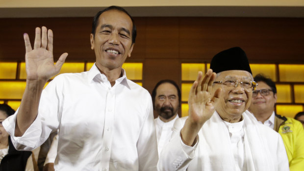 Indonesian President Joko Widodo, left, and his running mate Ma'ruf Amin