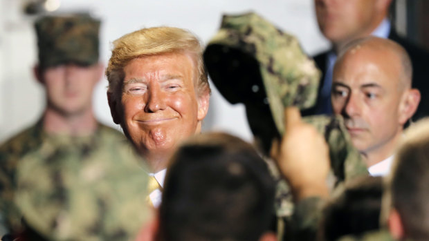 US President Donald Trump greeted US servicemen at the Yokosuka Naval Base on Tuesday.