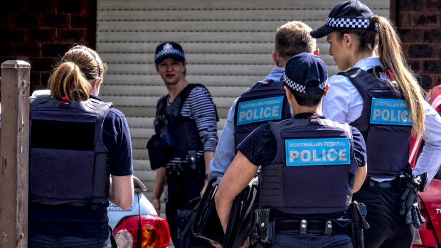 Police outside the Werribee home of Hassan Khalif Shire Ali's parents on Saturday.