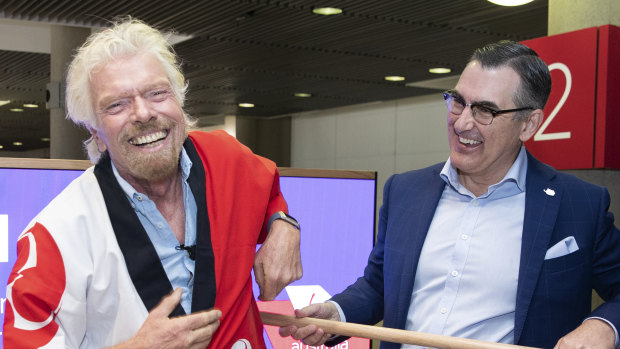Richard Branson and Virgin Australia CEO Paul Scurrah at Brisbane Airport in November last year. 