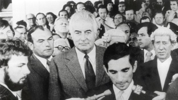 Watched by Gough Whitlam. David Smith, official secretary to the governor-general, reads the proclamation dissolving parliament following the dismissal of the Whitlam government in 1975.