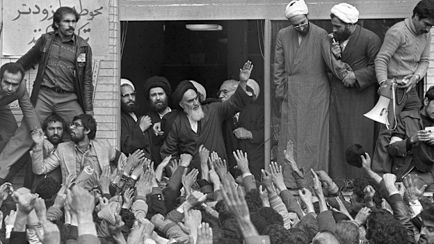 The Ayatollah Ruhollah Khomeini waves to followers in Tehran in 1979.