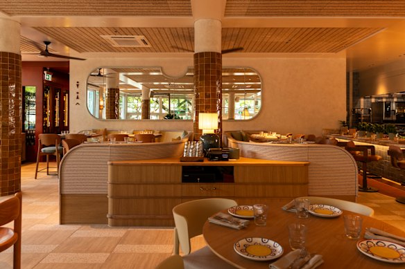 Cibaria’s warm and inviting dining room includes counter seating at the open kitchen.