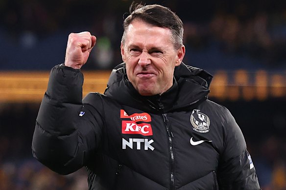 Craig McRae pumped his fist after the Magpies came away with a draw.