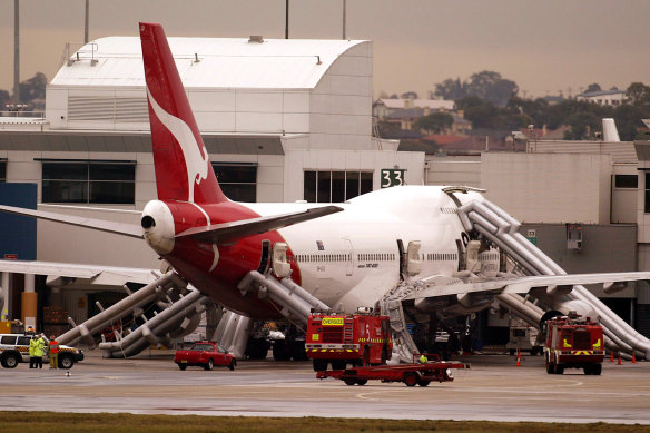 Slides were deployed from a Qantas jumbo jet at Sydney Airport in 2003 after smoke was detected in the cabin. Passengers evacuated safely though three were injured during the process.