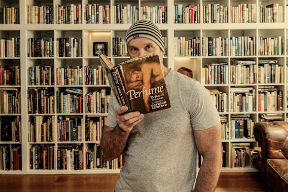Kevin Kennedy with the first English edition of German writer Patrick Suskind’s 1985 bestseller Perfume: The Story of a Murderer.