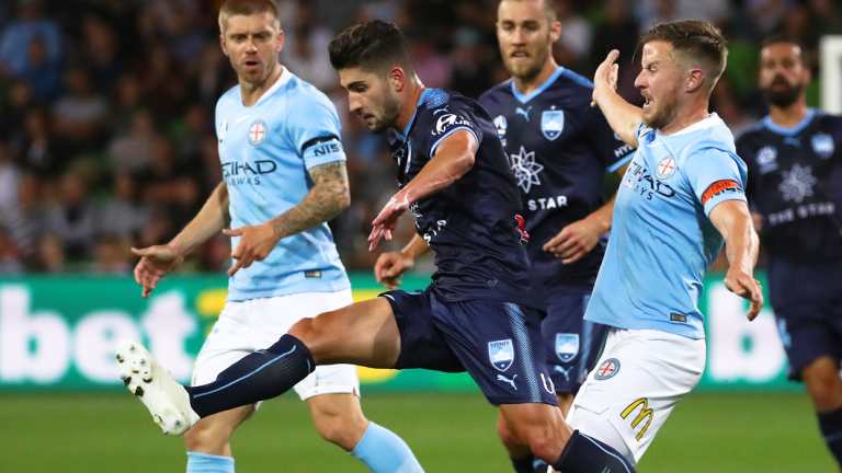 Retre navigates traffic for Sydney FC.